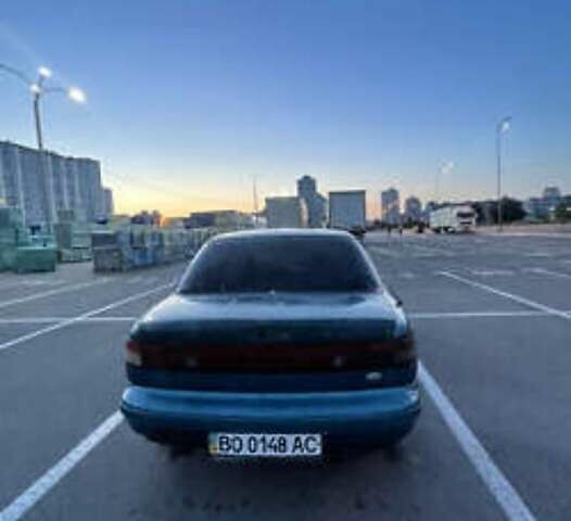 Синий Киа Сефия, объемом двигателя 1.6 л и пробегом 450 тыс. км за 800 $, фото 2 на Automoto.ua