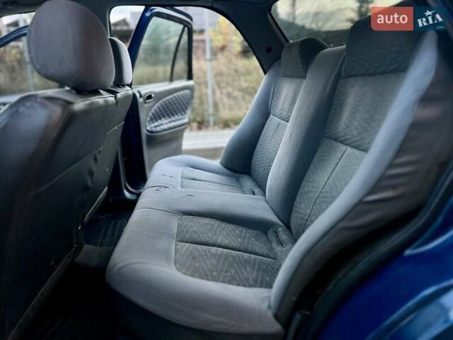 Синий Киа Сефия, объемом двигателя 1.5 л и пробегом 340 тыс. км за 1450 $, фото 10 на Automoto.ua