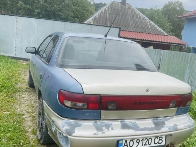 Синий Киа Сефия, объемом двигателя 1.5 л и пробегом 200 тыс. км за 400 $, фото 1 на Automoto.ua