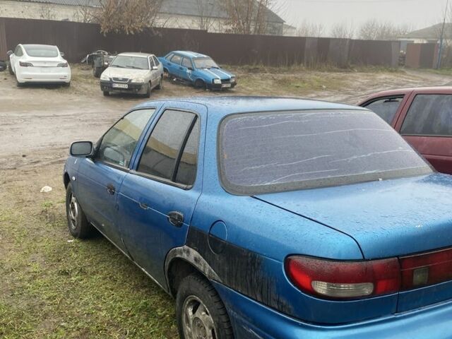 Синий Киа Сефия, объемом двигателя 1.5 л и пробегом 200 тыс. км за 710 $, фото 2 на Automoto.ua