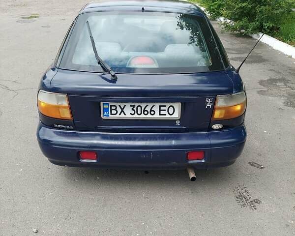 Синий Киа Сефия, объемом двигателя 1.6 л и пробегом 310 тыс. км за 850 $, фото 5 на Automoto.ua