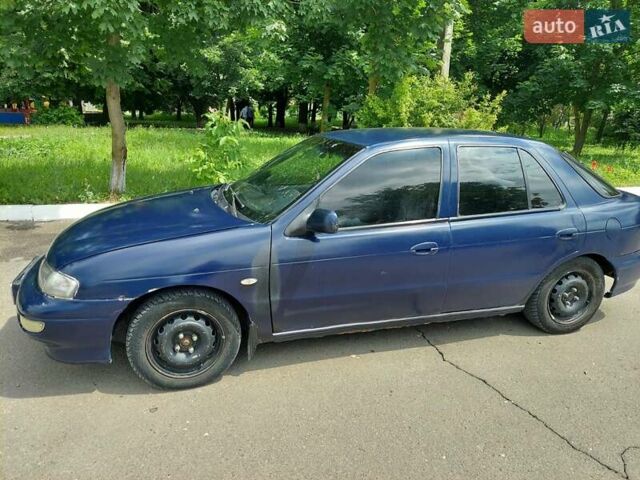 Синий Киа Сефия, объемом двигателя 1.6 л и пробегом 310 тыс. км за 850 $, фото 6 на Automoto.ua