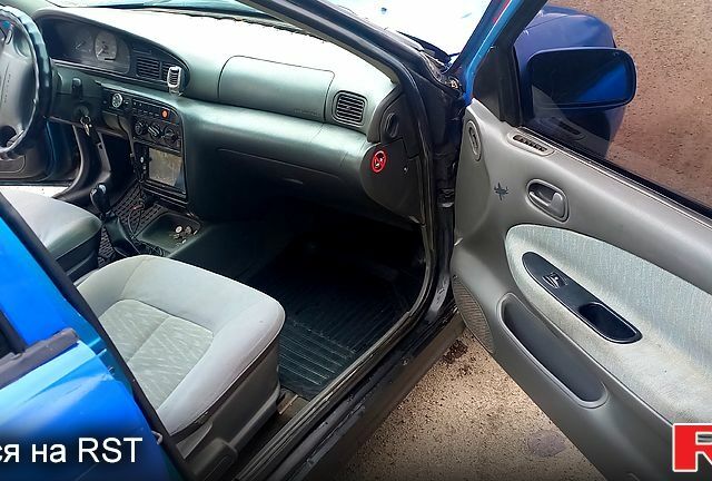 Синий Киа Сефия, объемом двигателя 1.5 л и пробегом 205 тыс. км за 1500 $, фото 4 на Automoto.ua