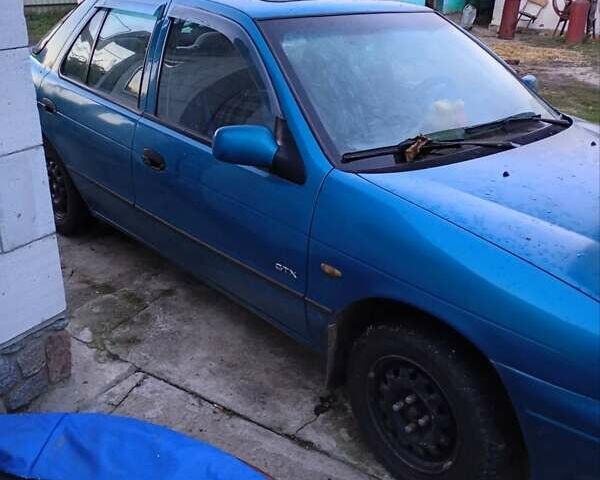 Синій Кіа Сефія, об'ємом двигуна 1.49 л та пробігом 226 тис. км за 1700 $, фото 6 на Automoto.ua