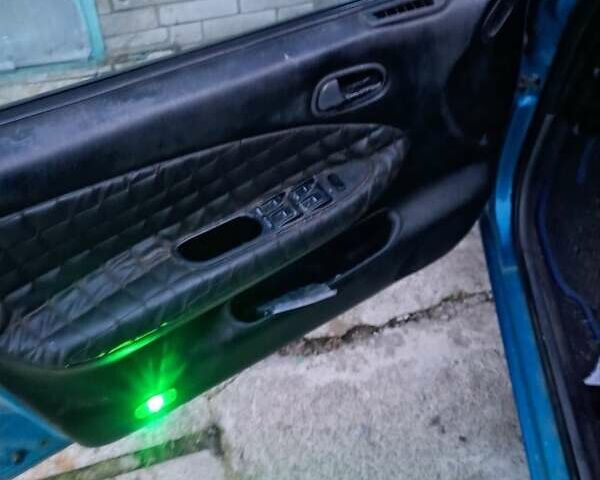Синій Кіа Сефія, об'ємом двигуна 1.49 л та пробігом 226 тис. км за 1700 $, фото 5 на Automoto.ua