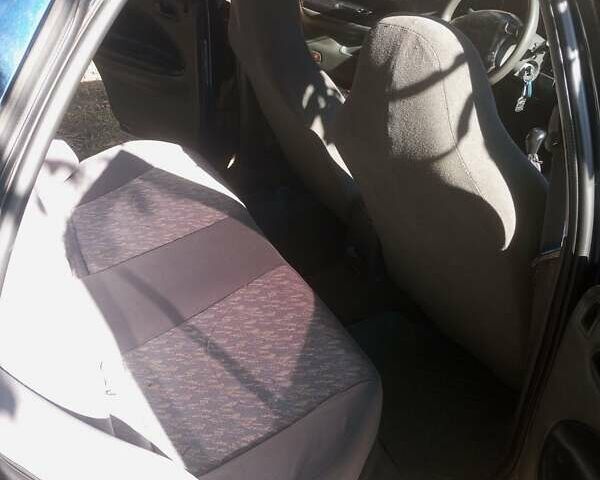 Синий Киа Сефия, объемом двигателя 1.8 л и пробегом 233 тыс. км за 1250 $, фото 9 на Automoto.ua