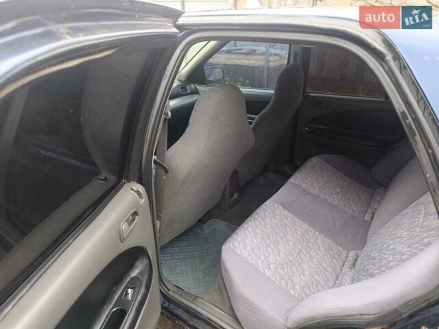 Синій Кіа Сефія, об'ємом двигуна 1.79 л та пробігом 235 тис. км за 1000 $, фото 5 на Automoto.ua