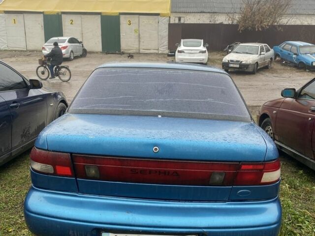 Синий Киа Сефия, объемом двигателя 1.5 л и пробегом 200 тыс. км за 710 $, фото 1 на Automoto.ua