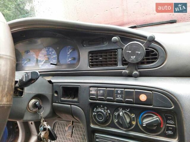 Синий Киа Сефия, объемом двигателя 1.6 л и пробегом 310 тыс. км за 850 $, фото 1 на Automoto.ua
