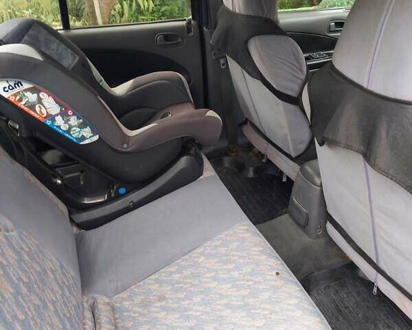 Синий Киа Сефия, объемом двигателя 1.6 л и пробегом 310 тыс. км за 850 $, фото 3 на Automoto.ua