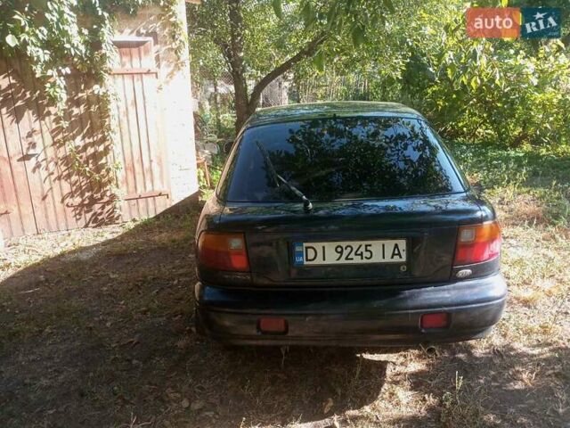 Синий Киа Сефия, объемом двигателя 1.8 л и пробегом 233 тыс. км за 1250 $, фото 2 на Automoto.ua