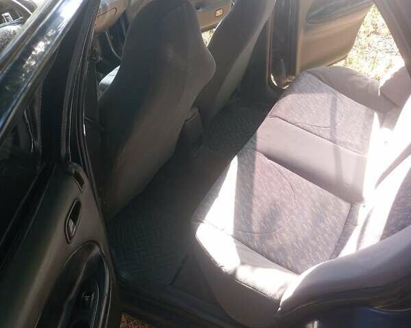 Синий Киа Сефия, объемом двигателя 1.8 л и пробегом 233 тыс. км за 1250 $, фото 8 на Automoto.ua