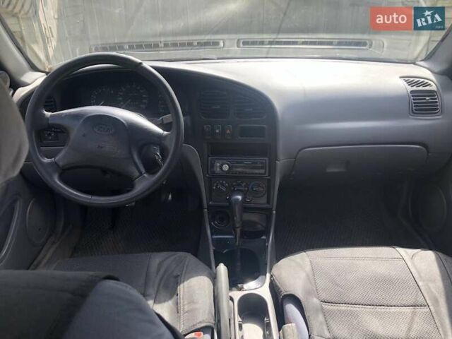 Синий Киа Сефия, объемом двигателя 1.5 л и пробегом 300 тыс. км за 1000 $, фото 5 на Automoto.ua