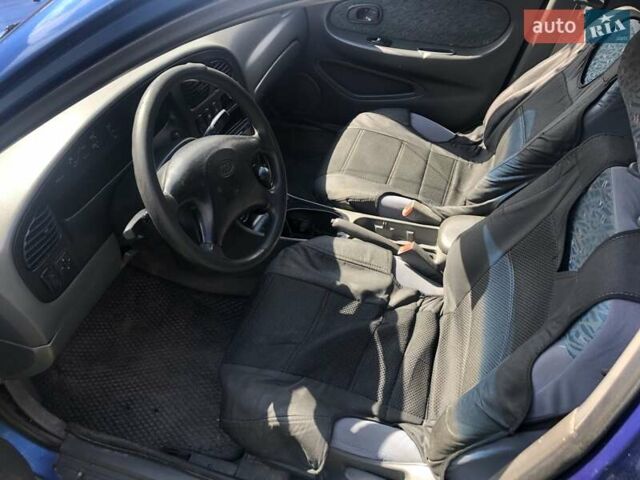 Синий Киа Сефия, объемом двигателя 1.5 л и пробегом 300 тыс. км за 1000 $, фото 4 на Automoto.ua