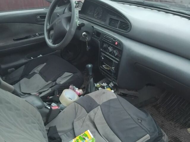 Синий Киа Сефия, объемом двигателя 0 л и пробегом 446 тыс. км за 952 $, фото 4 на Automoto.ua