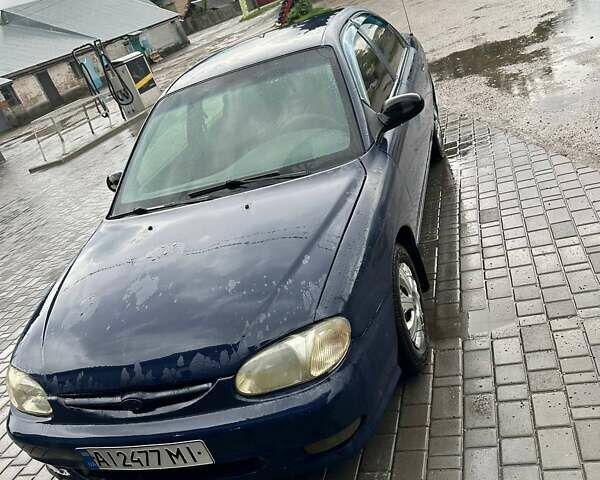 Синій Кіа Сефія, об'ємом двигуна 1.5 л та пробігом 420 тис. км за 2200 $, фото 5 на Automoto.ua