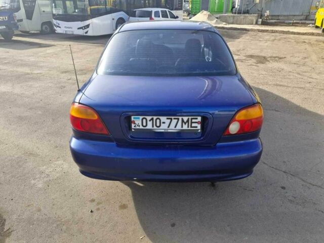 Синий Киа Сефия, объемом двигателя 1.5 л и пробегом 659 тыс. км за 1890 $, фото 2 на Automoto.ua