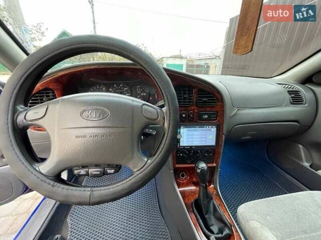 Синий Киа Сефия, объемом двигателя 1.8 л и пробегом 248 тыс. км за 3200 $, фото 7 на Automoto.ua