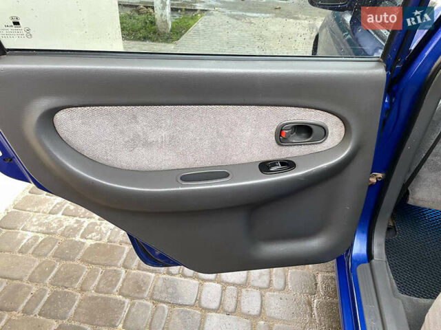 Синий Киа Сефия, объемом двигателя 1.8 л и пробегом 248 тыс. км за 3200 $, фото 9 на Automoto.ua