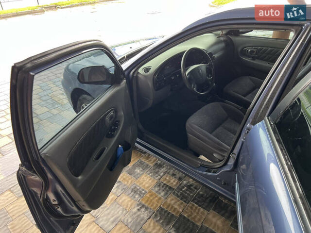 Синий Киа Сефия, объемом двигателя 1.6 л и пробегом 102 тыс. км за 4355 $, фото 20 на Automoto.ua