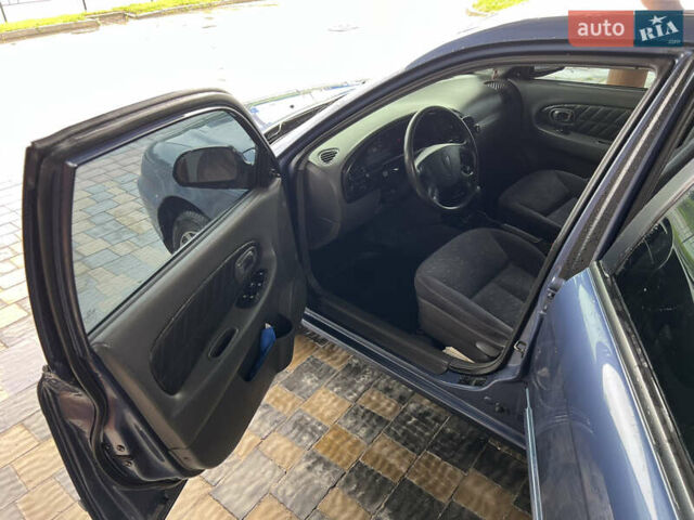 Синий Киа Сефия, объемом двигателя 1.6 л и пробегом 105 тыс. км за 4100 $, фото 16 на Automoto.ua