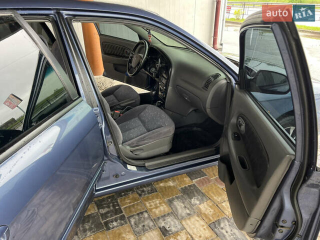 Синий Киа Сефия, объемом двигателя 1.6 л и пробегом 102 тыс. км за 4355 $, фото 25 на Automoto.ua