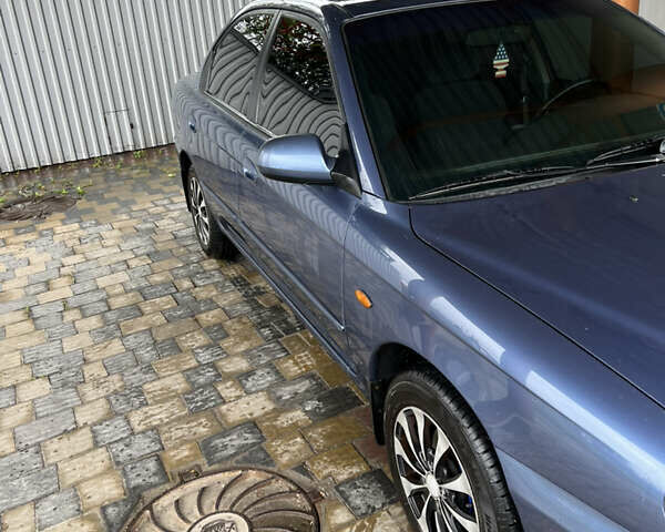 Синий Киа Сефия, объемом двигателя 1.6 л и пробегом 102 тыс. км за 4355 $, фото 7 на Automoto.ua