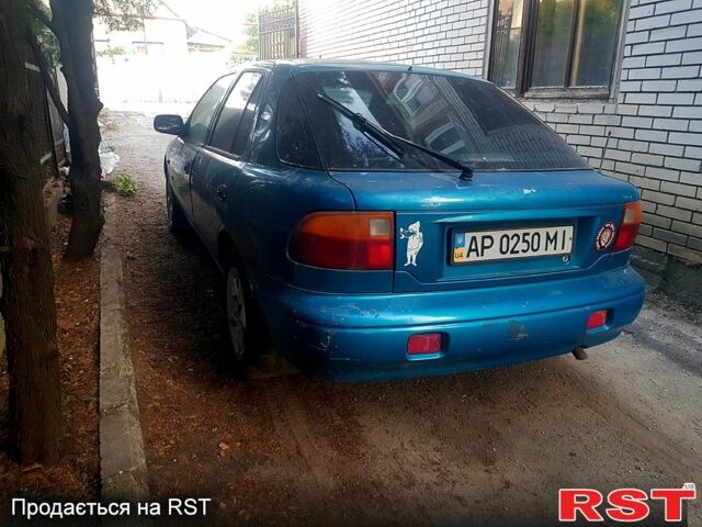 Синий Киа Сефия, объемом двигателя 1.5 л и пробегом 200 тыс. км за 1300 $, фото 2 на Automoto.ua