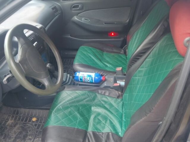 Зеленый Киа Сефия, объемом двигателя 1.5 л и пробегом 333 тыс. км за 1000 $, фото 6 на Automoto.ua