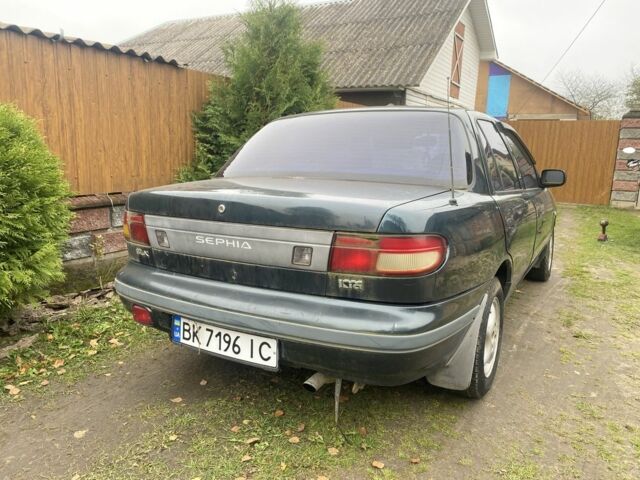 Зеленый Киа Сефия, объемом двигателя 1.6 л и пробегом 320 тыс. км за 870 $, фото 3 на Automoto.ua