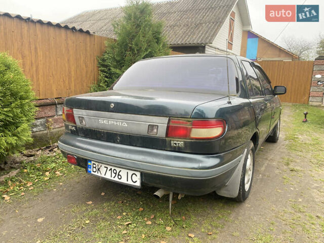 Зеленый Киа Сефия, объемом двигателя 1.6 л и пробегом 320 тыс. км за 870 $, фото 3 на Automoto.ua