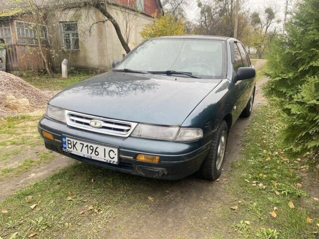 Зеленый Киа Сефия, объемом двигателя 1.6 л и пробегом 320 тыс. км за 870 $, фото 4 на Automoto.ua