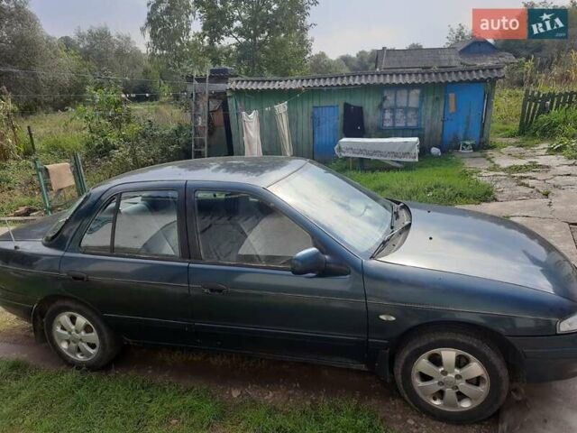 Зелений Кіа Сефія, об'ємом двигуна 1.6 л та пробігом 280 тис. км за 1500 $, фото 27 на Automoto.ua