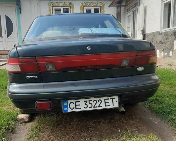 Зелений Кіа Сефія, об'ємом двигуна 1.6 л та пробігом 280 тис. км за 1500 $, фото 24 на Automoto.ua