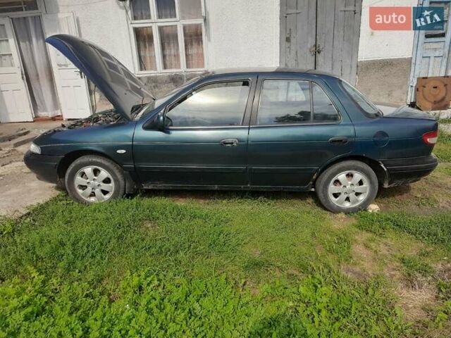 Зелений Кіа Сефія, об'ємом двигуна 1.6 л та пробігом 280 тис. км за 1500 $, фото 30 на Automoto.ua