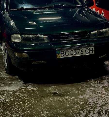 Зеленый Киа Сефия, объемом двигателя 1.5 л и пробегом 318 тыс. км за 1450 $, фото 2 на Automoto.ua