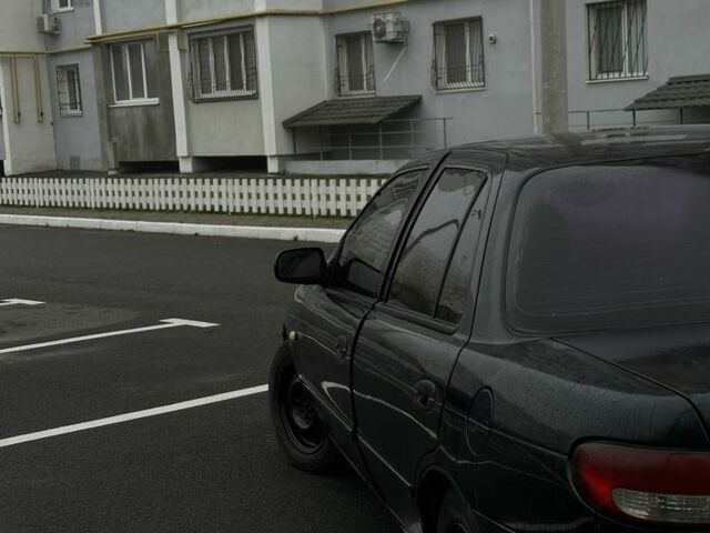 Зеленый Киа Сефия, объемом двигателя 1.6 л и пробегом 320 тыс. км за 1001 $, фото 4 на Automoto.ua