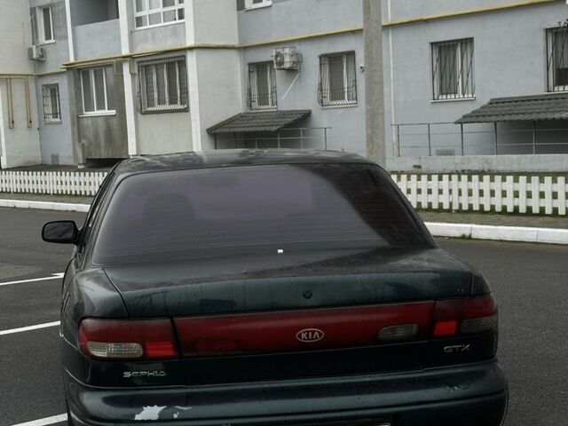 Зеленый Киа Сефия, объемом двигателя 1.6 л и пробегом 320 тыс. км за 1001 $, фото 3 на Automoto.ua