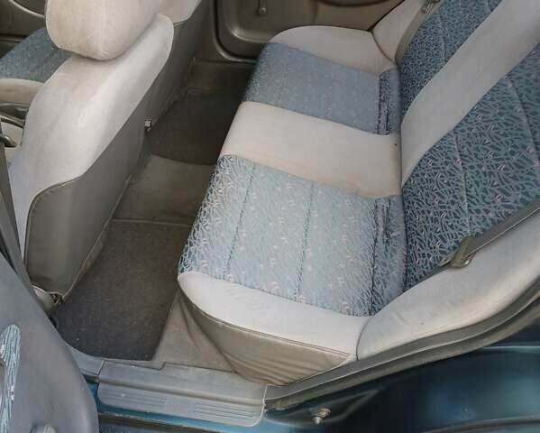 Зелений Кіа Сефія, об'ємом двигуна 1.5 л та пробігом 269 тис. км за 1299 $, фото 18 на Automoto.ua
