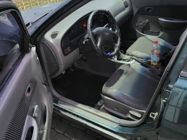 Зелений Кіа Сефія, об'ємом двигуна 1.5 л та пробігом 280 тис. км за 1200 $, фото 6 на Automoto.ua