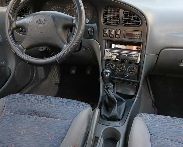 Зелений Кіа Сефія, об'ємом двигуна 1.5 л та пробігом 269 тис. км за 1299 $, фото 2 на Automoto.ua