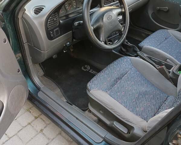 Зелений Кіа Сефія, об'ємом двигуна 1.5 л та пробігом 269 тис. км за 1299 $, фото 3 на Automoto.ua