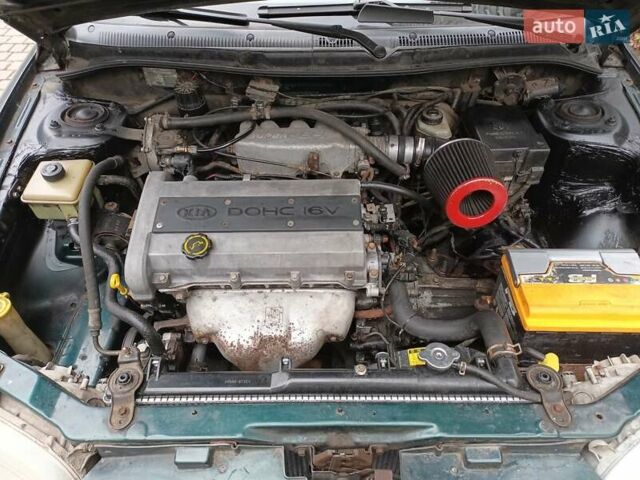 Зелений Кіа Сефія, об'ємом двигуна 1.5 л та пробігом 269 тис. км за 1299 $, фото 59 на Automoto.ua