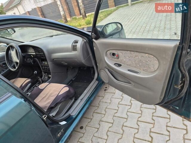 Зелений Кіа Сефія, об'ємом двигуна 1.6 л та пробігом 197 тис. км за 1500 $, фото 19 на Automoto.ua