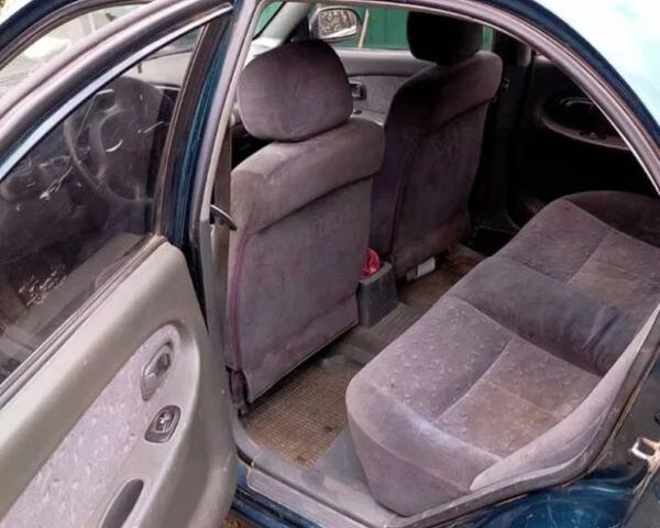 Зелений Кіа Сефія, об'ємом двигуна 26 л та пробігом 236 тис. км за 1300 $, фото 3 на Automoto.ua