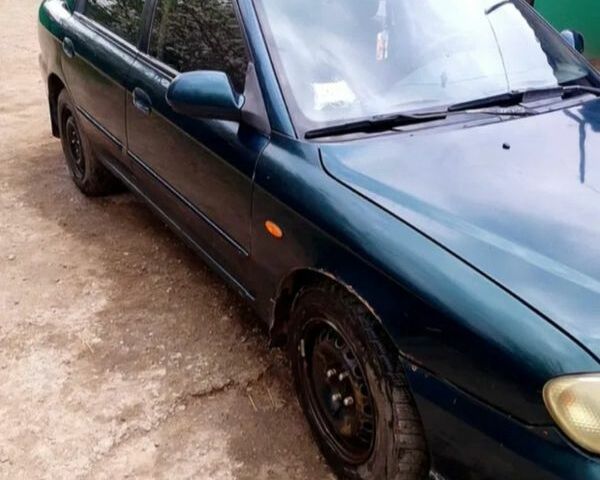 Зелений Кіа Сефія, об'ємом двигуна 26 л та пробігом 236 тис. км за 1300 $, фото 1 на Automoto.ua