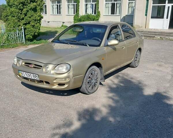Бежевый Киа Шума, объемом двигателя 1.5 л и пробегом 380 тыс. км за 1650 $, фото 1 на Automoto.ua