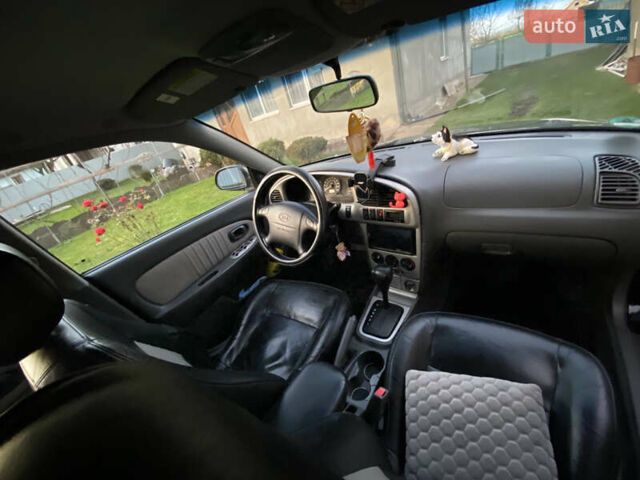 Черный Киа Шума, объемом двигателя 1.6 л и пробегом 308 тыс. км за 3100 $, фото 19 на Automoto.ua