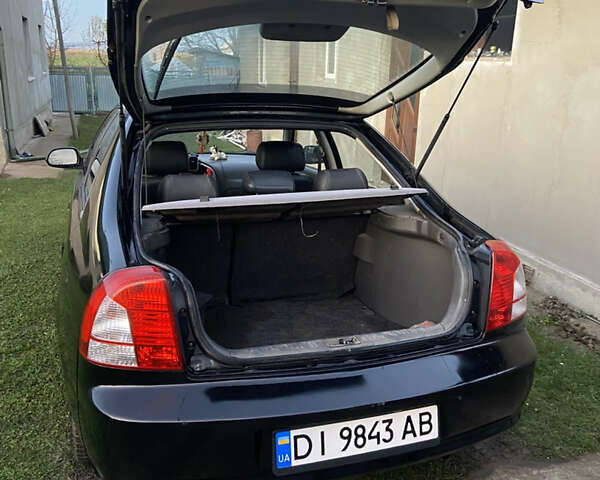 Черный Киа Шума, объемом двигателя 1.6 л и пробегом 308 тыс. км за 3100 $, фото 3 на Automoto.ua