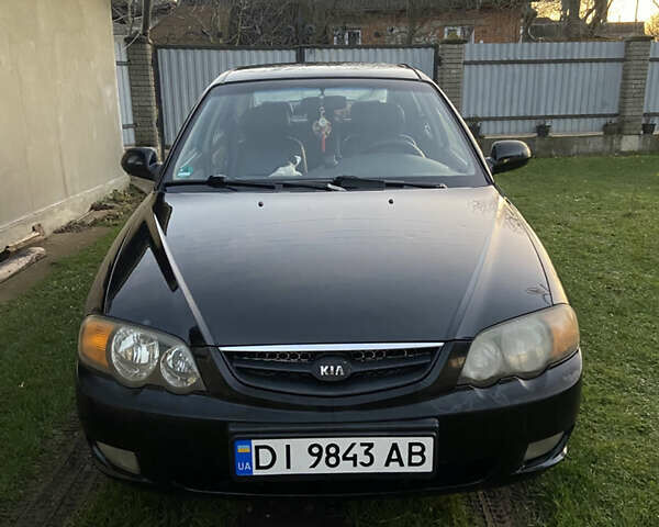 Черный Киа Шума, объемом двигателя 1.6 л и пробегом 308 тыс. км за 3100 $, фото 1 на Automoto.ua